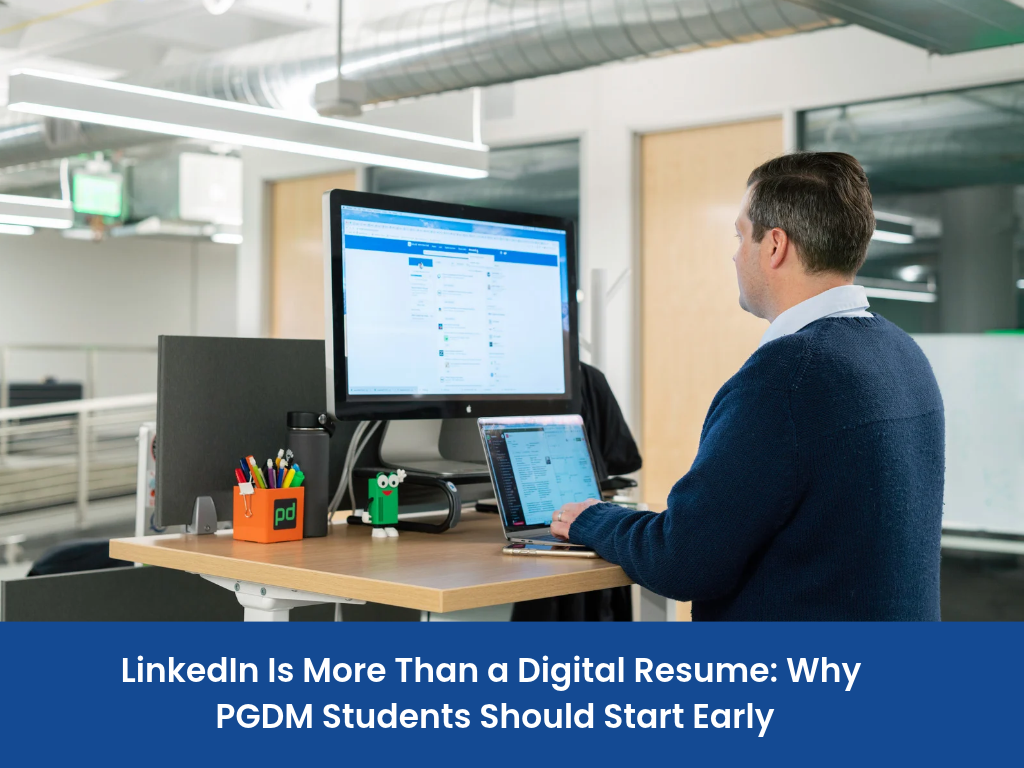 man in blue sweater using linkedin